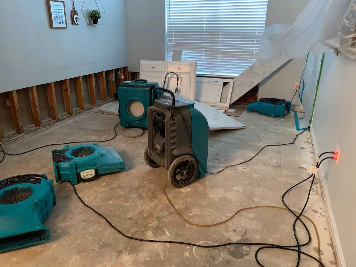 Dehumidifier in flood-cut room for Water Damage Restoration in Beachwood